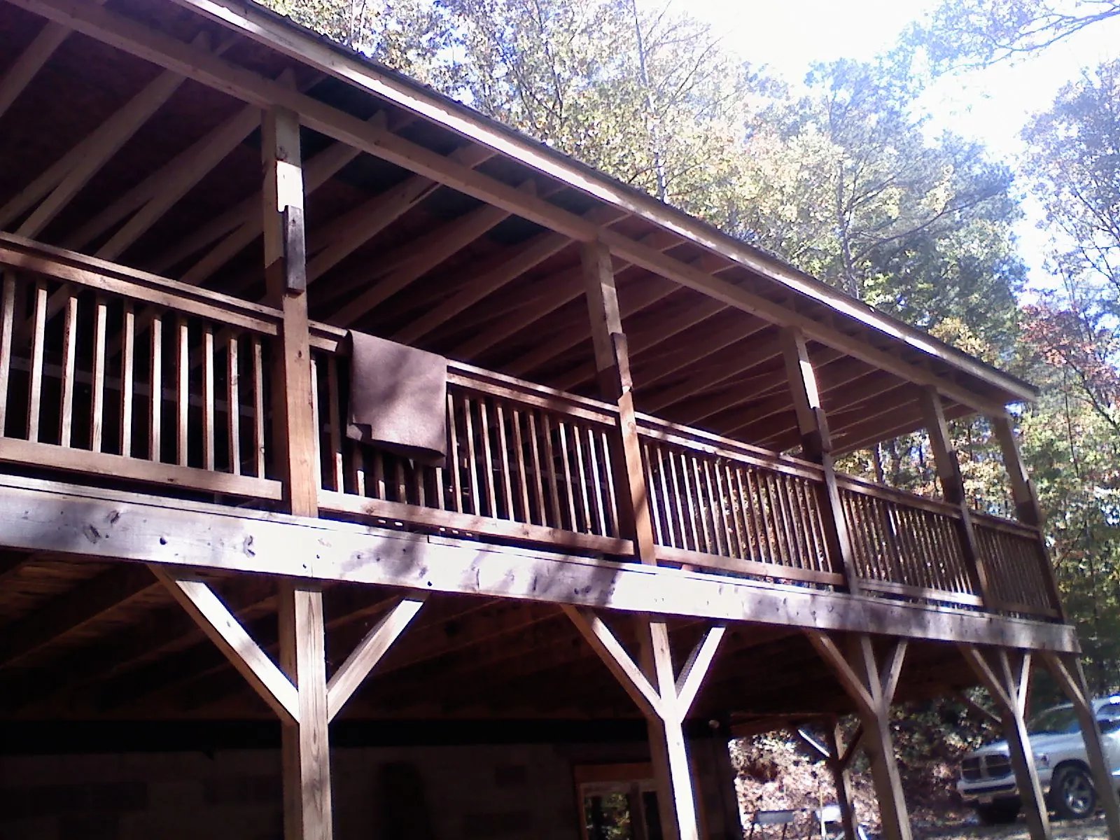 Timber framing under a new elevated porch and deck — Roof Leak Repair in Wheatcroft by Roofing Brothers